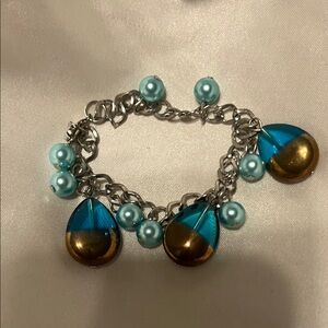 Elegant Blue and Gold Charm Bracelet